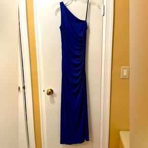 Beautiful blue evening dress. Has some details on the side.